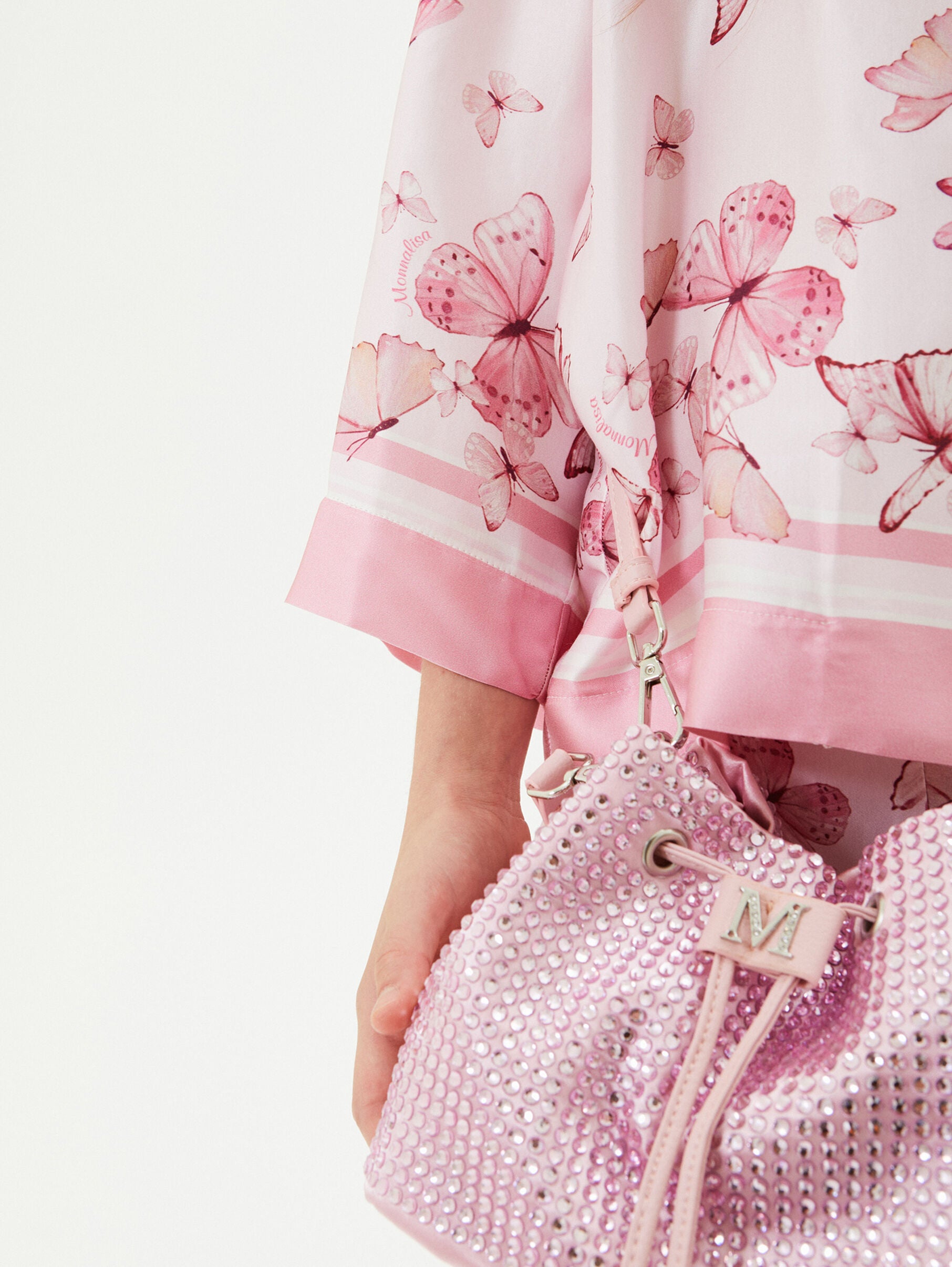 Rhinestone bucket coated fabric