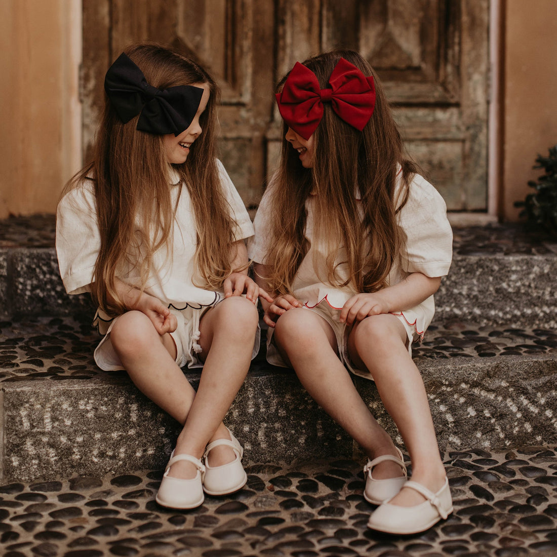 Discover the Alessia Bow in Rosso, a signature piece by Lessi the Label. Crafted for elegance, this extra-large bow makes your little one feel like royalty. Available in multiple colors to complement any style. Enjoy worldwide shipping and 10% off your first order!