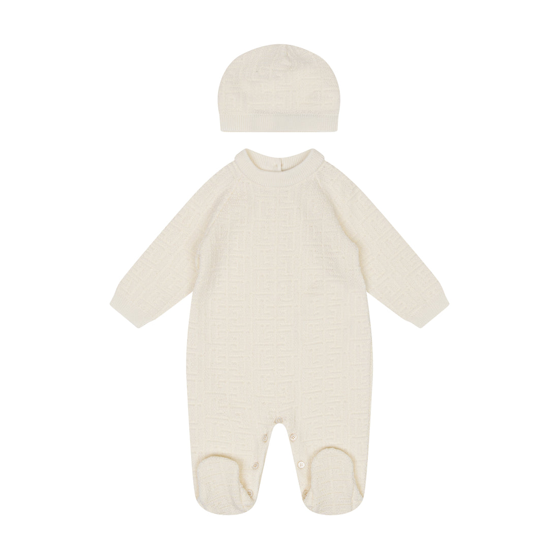 Cream-colored baby onesie with matching hat on a white background