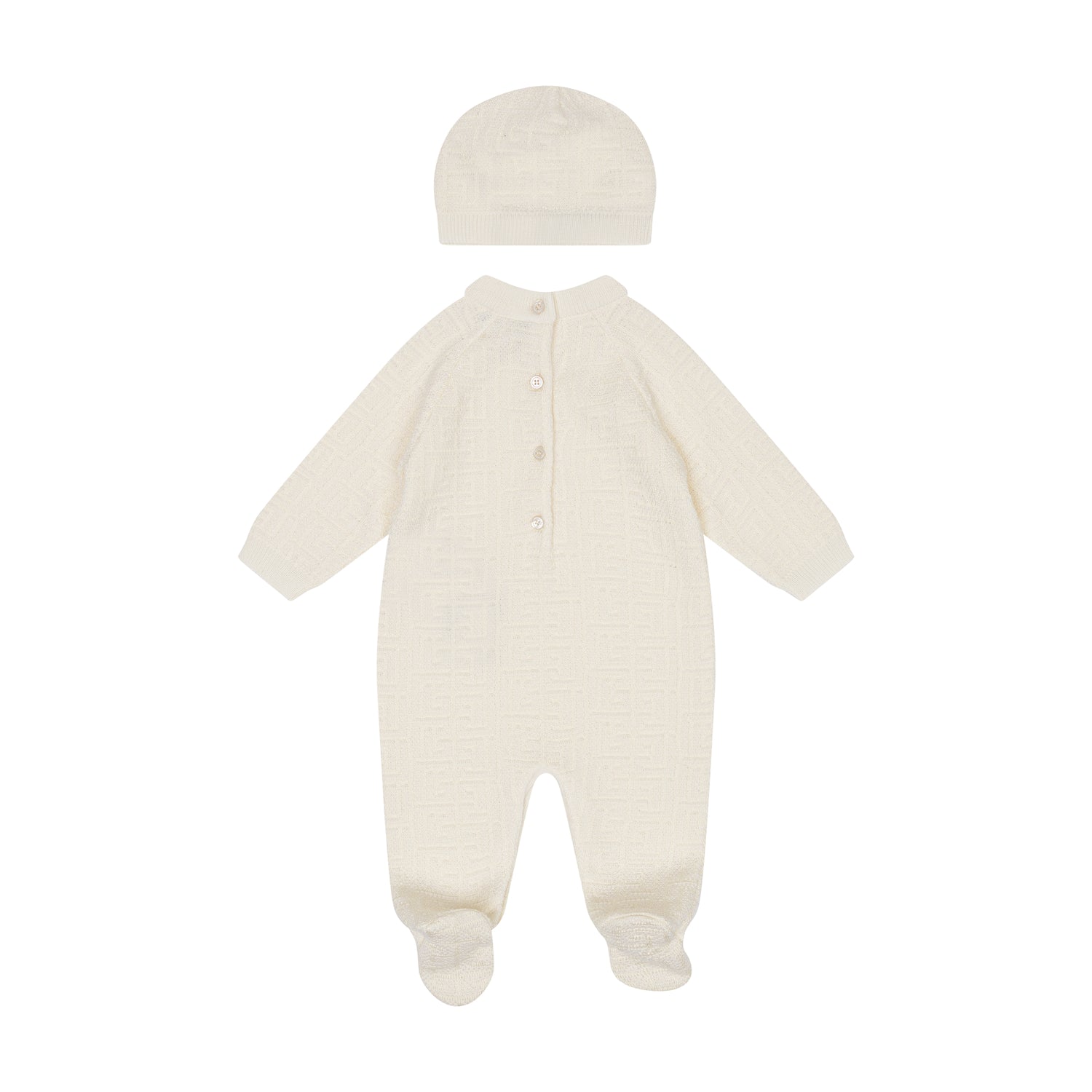 White baby onesie with hat on a white background