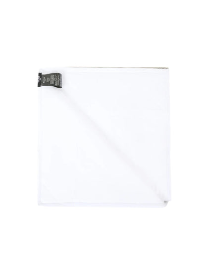 White shirt with a black tag on a white background