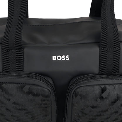 Coated Fabric Changing Bag with Monogram Perforations and Jacquard Handles